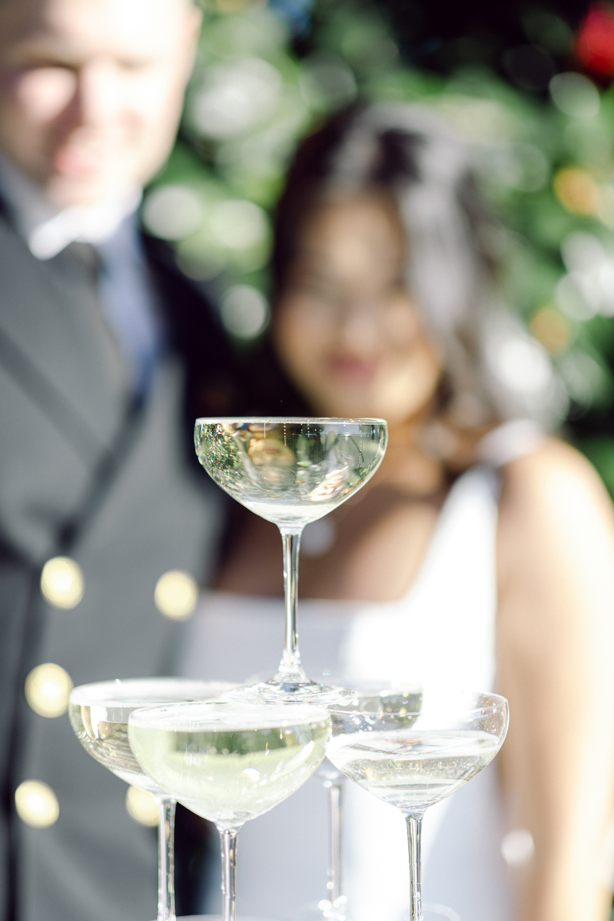 close up image of a champagne tower taken by Virginia Beach wedding photographers Glenn and Nadya