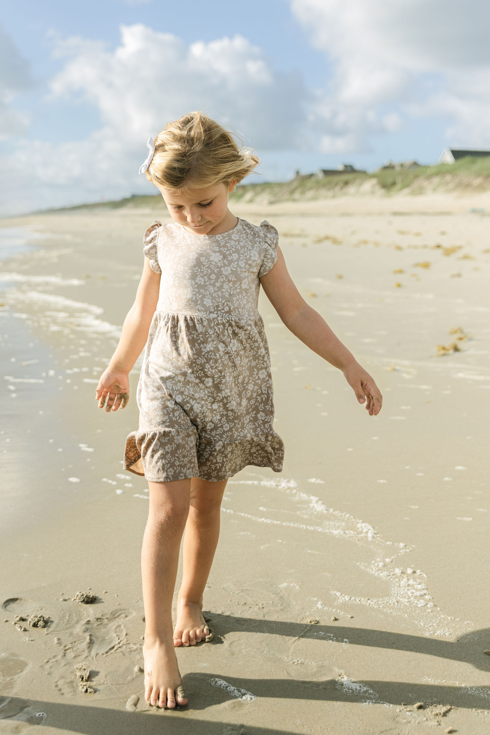 A girl walking on the beach