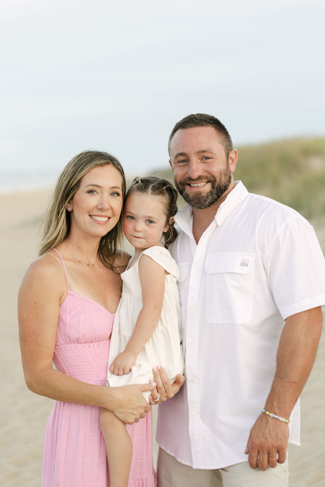 family of three at Corolla nc beach, close up portrait