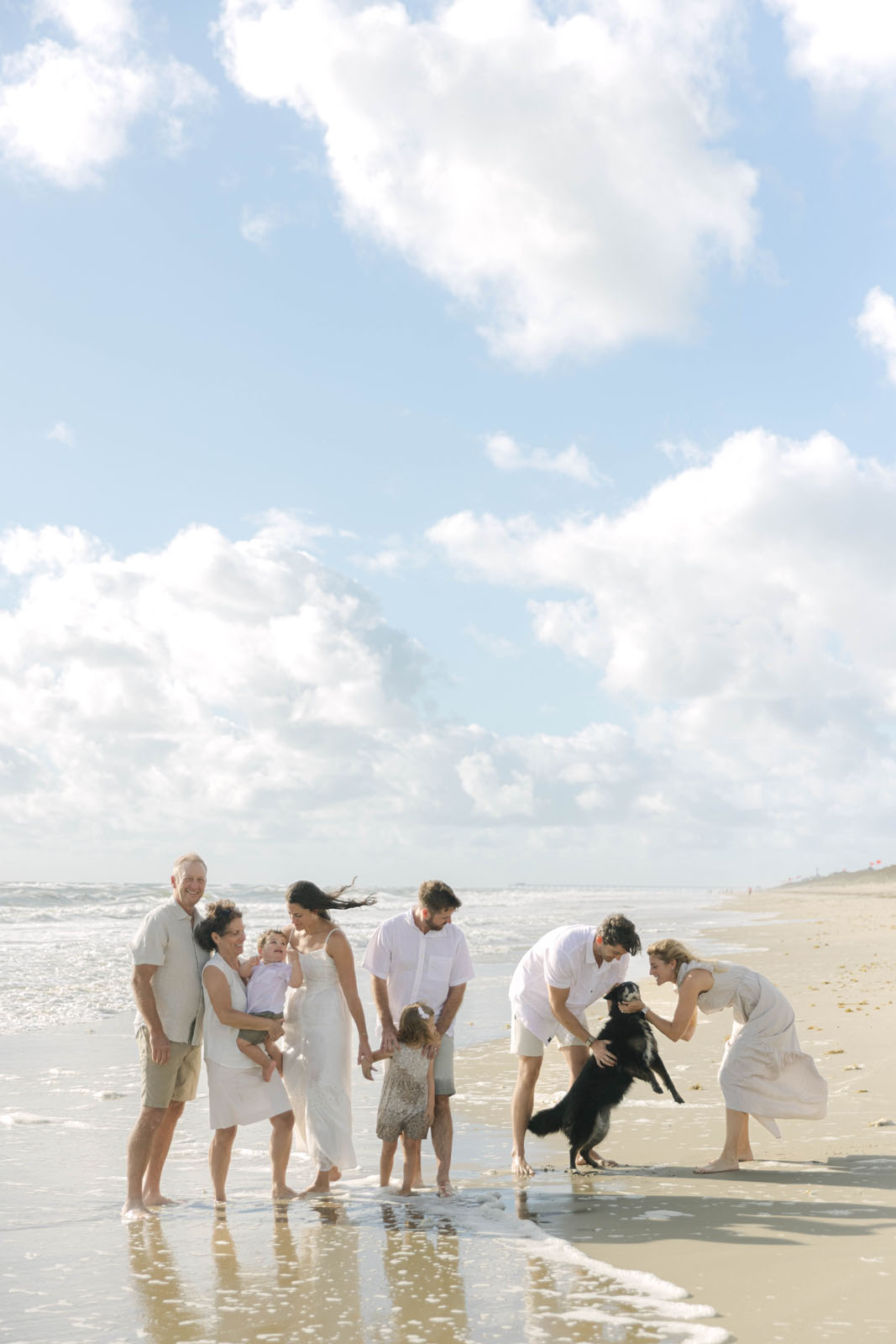 Family gathered together for morning beach photos on the Outer Banks