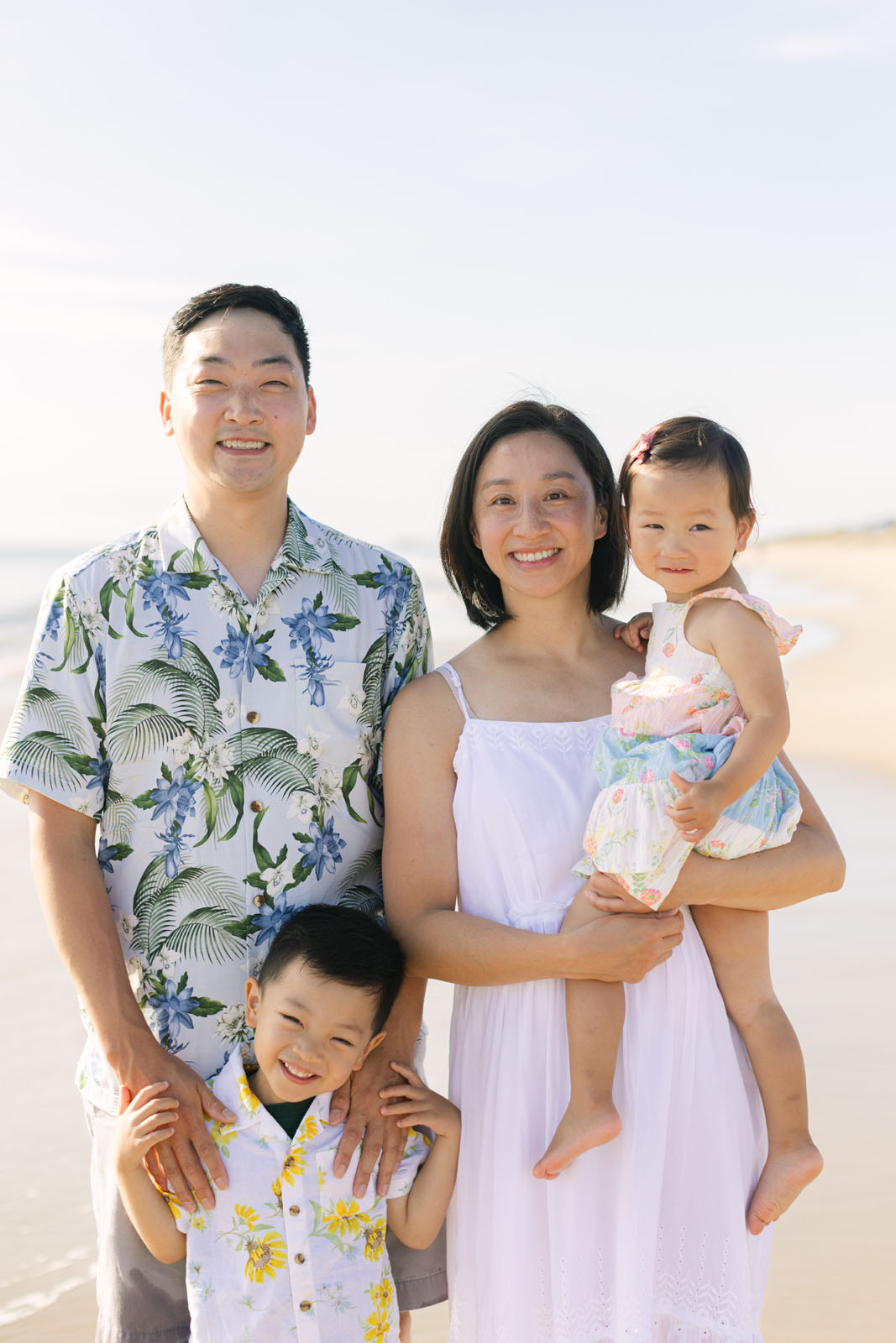 Family portrait on an Outer Banks beach during the morning hours 